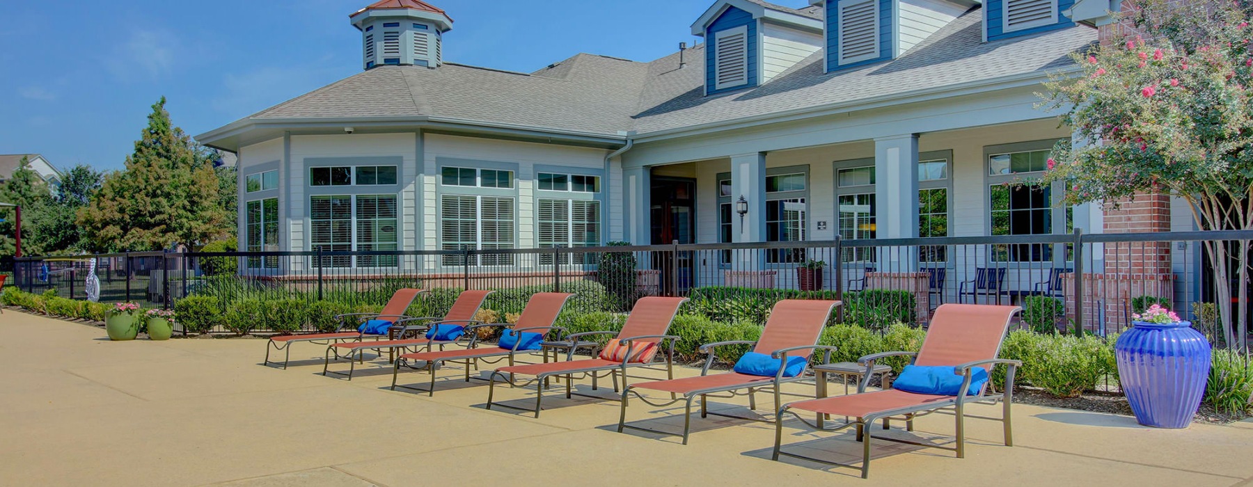 a row of lounge chairs outside