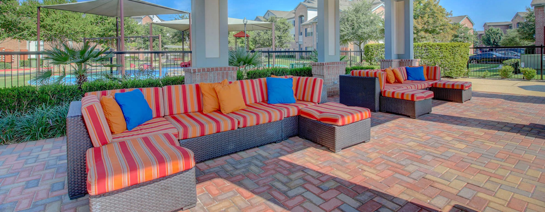 covered patio with ceiling fans
